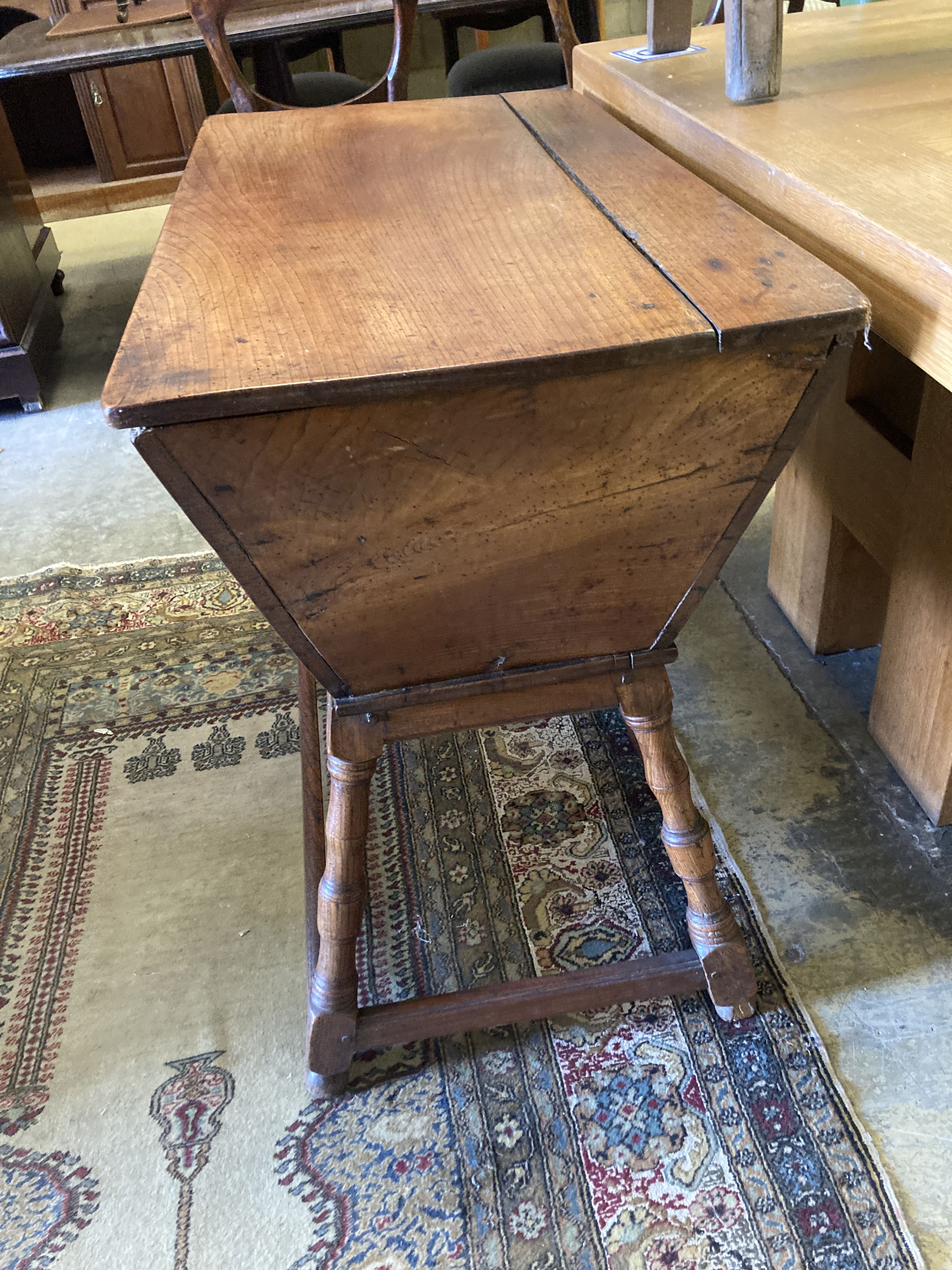 An 18th century elm and fruitwood dough bin, length 90cm, depth 47cm, height 76cm